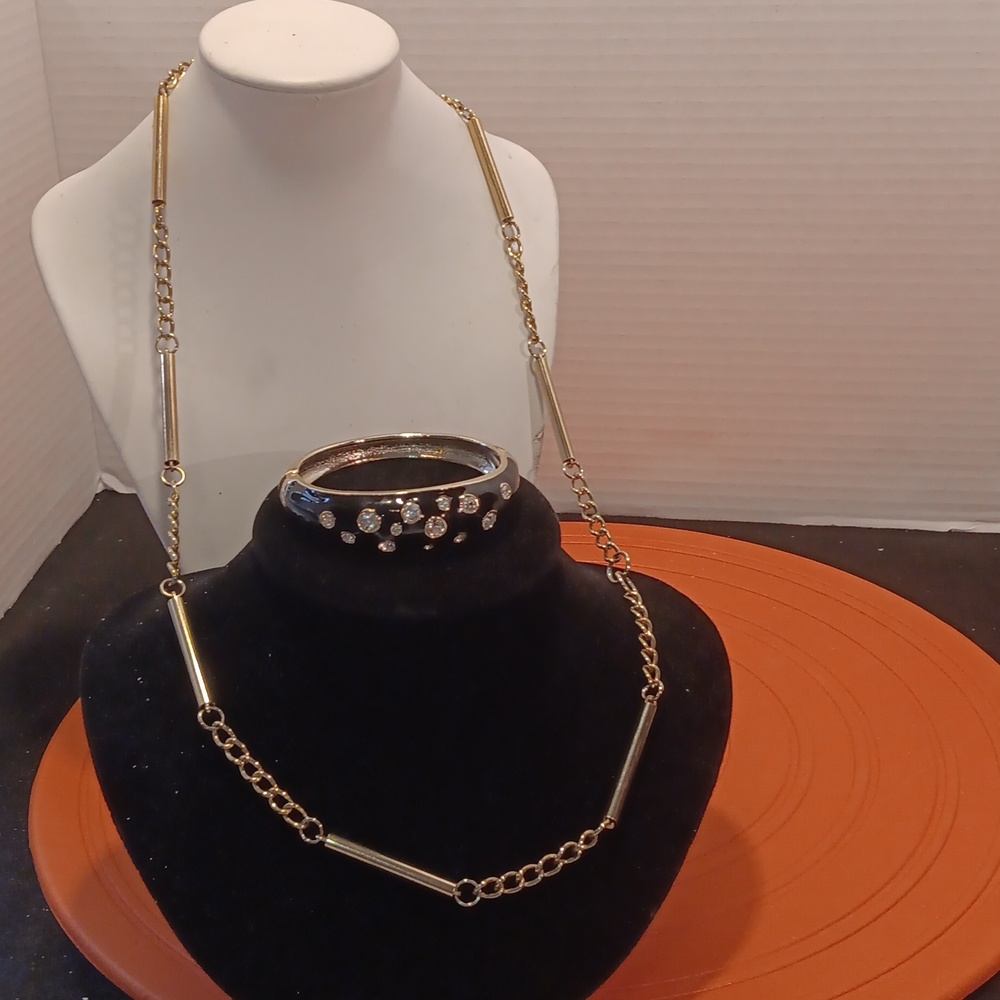 Long gold necklace with bracelet